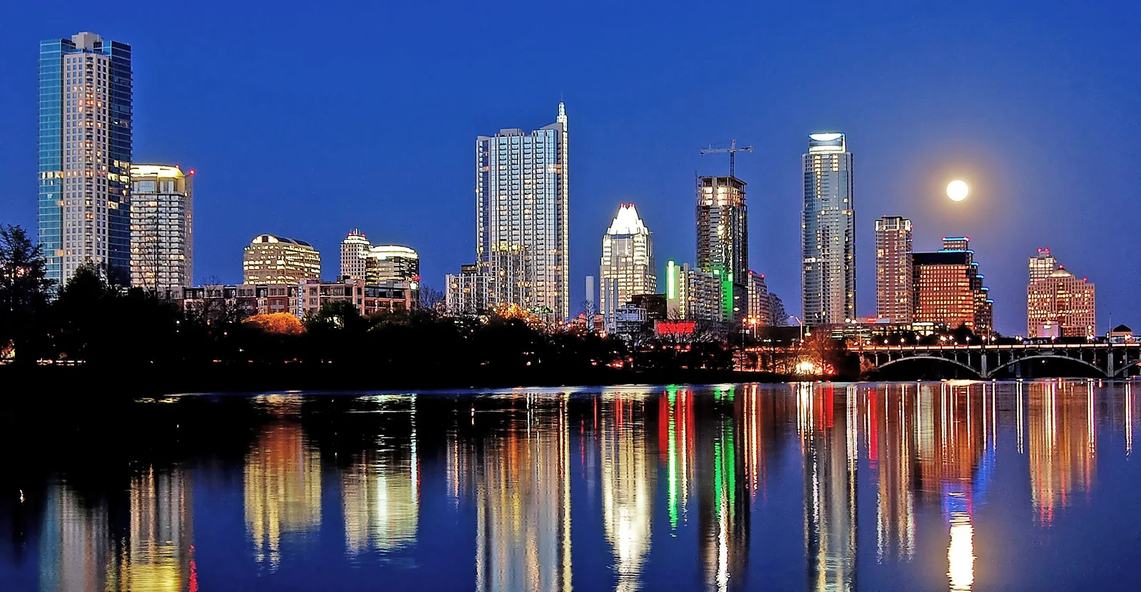 Austin skyline and Lady Bird Lake at night, photographed from Lou Neff Point in 2010
