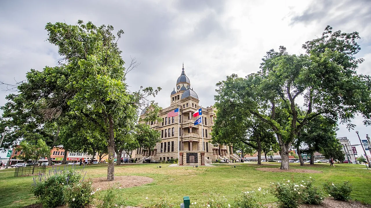 Denton County Courthouse-on-the-Square framed by trees in 2017