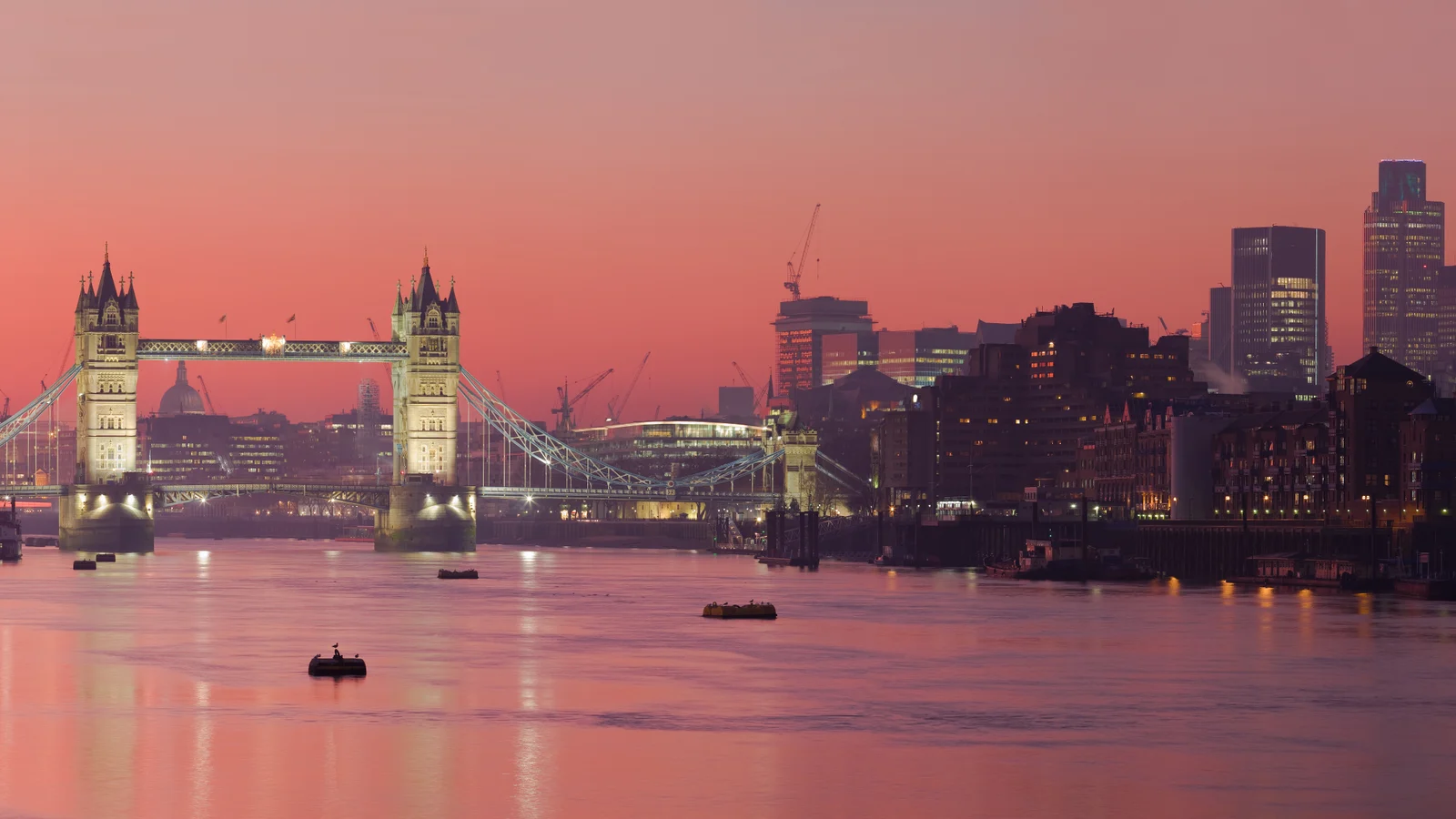 Tower Bridge and the London skyline beside the Thames at sunset in February 2008