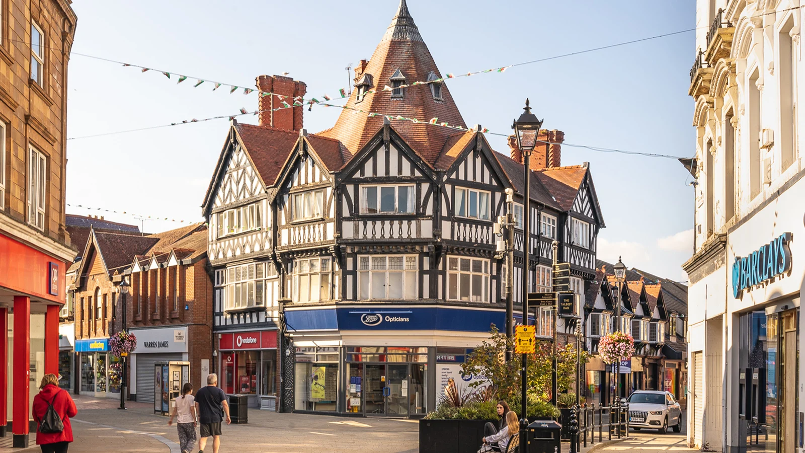 Historic buildings and shops in Wrexham city centre in August 2022